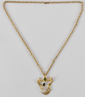 Lot 760 - An Edwardian gem set pendant with peridot to...