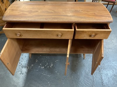 Lot 35 - ERCOL; a mid century light elm sideboard, with...
