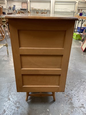Lot 35 - ERCOL; a mid century light elm sideboard, with...
