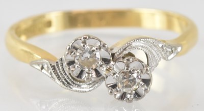 Lot 793 - An 18ct gold diamond illusion set double...