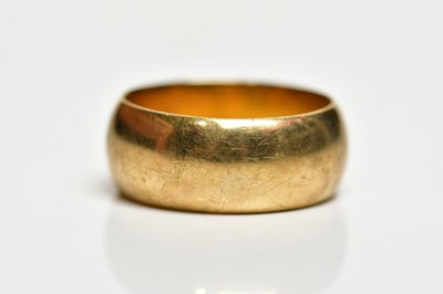 Lot 1469 - A broad 9ct yellow gold wedding band, size W...