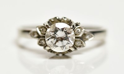 Lot 1307 - A white metal diamond solitaire ring, the four...