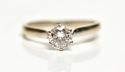 Lot 1348 - An 18ct yellow gold diamond solitaire ring,...