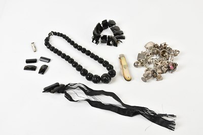 Lot 1745 - A silver charm bracelet, charms including jug,...
