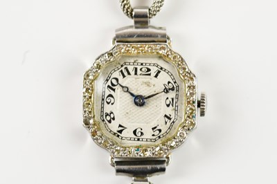 Lot 1868 - A 9ct white gold diamond set cocktail...