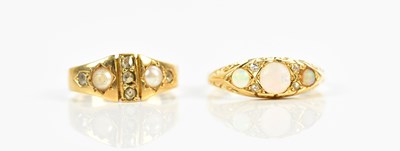Lot 1464 - Two yellow metal dress rings, one set with...