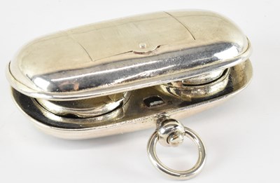 Lot 683 - A white metal sovereign case, with stamp case...