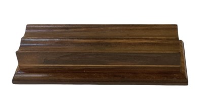 Lot 293 - DAVID LINLEY FOR DUNHILL; a carved walnut and...