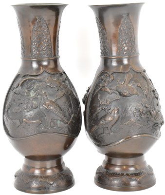Lot 374 - A pair of early 20th century Japanese bronze...