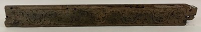 Lot 747 - A 17th century 'Greenman' carved panel, length...