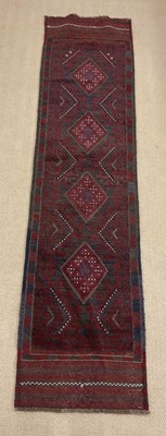 Lot 690 - A Meshwani runner rug, 234 x 58cm