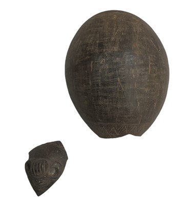 Lot 1136 - A small Melanesian carved wooden tool, mainly...