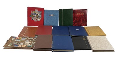 Lot 401 - Fourteen albums of all world stamps and...