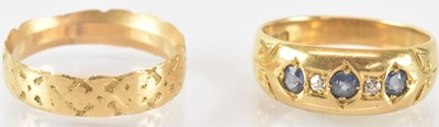 Lot 762 - An 18ct yellow gold sapphire and diamond set...
