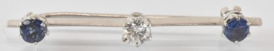 Lot 739 - A white metal diamond and sapphire set bar...