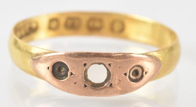 Lot 844 - A 22ct yellow gold ring (lacking stones), size...