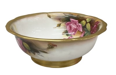 Lot 489 - ROYAL WORCESTER; a blush hand painted gilt and...