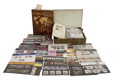 Lot 404 - A quantity of GB presentation packs, an album...
