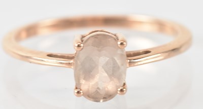 Lot 834 - A 9ct rose gold Zambezia morganite set ring,...