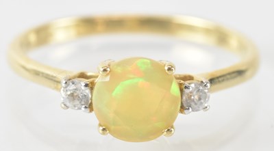 Lot 885 - A 9ct yellow gold white zircon and opal set...