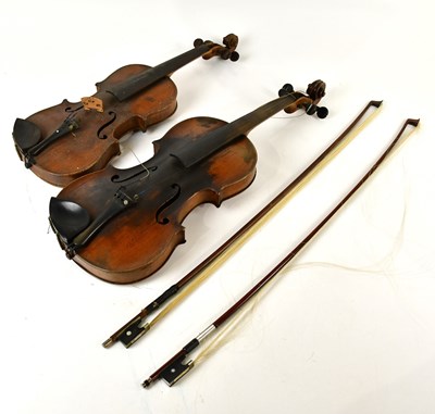Lot 1567 - A full size German violin, a half size violin...