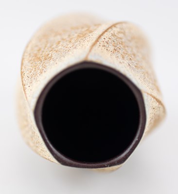 Lot 29 - EMILY MYERS (born 1965); a faceted terracotta...
