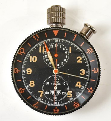 Lot 1477 - HEUER; a rare Super Autavia chronograph manual...