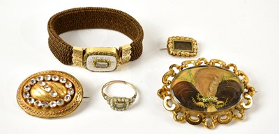 Lot 1468 - MOURNING JEWELLERY; a selection of Victorian...