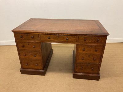 Lot 769 - A late 19th century oak twin pedestal nine...