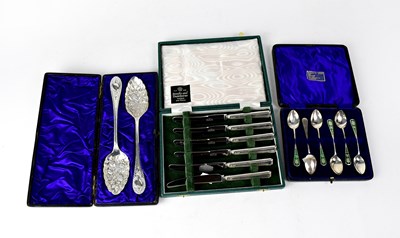 Lot 673 - A cased set of Edwardian silver and green...