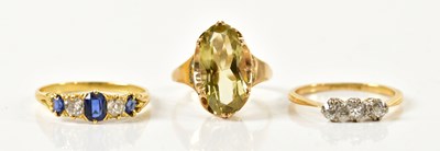 Lot 1469 - A yellow metal diamond and sapphire five stone...