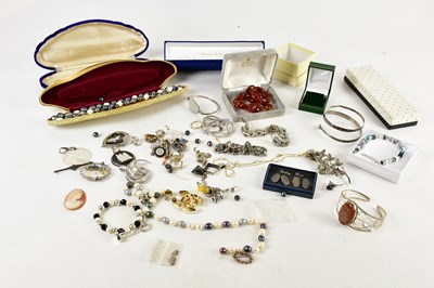 Lot 1747 - A collection of costume and silver jewellery,...