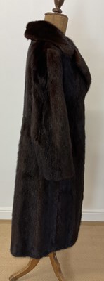 Lot 85 - A full length dark brown mink coat with 3/4...
