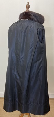Lot 85 - A full length dark brown mink coat with 3/4...