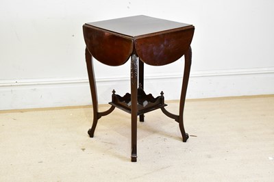 Lot 2420 - An early 20th century carved mahogany...