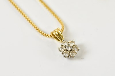 Lot 1613 - An 18ct yellow gold box link chain supporting...