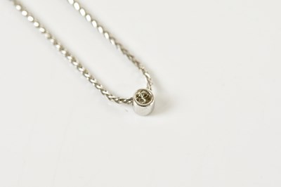 Lot 348 - An 18ct white gold chain suspending a small...