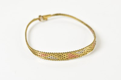 Lot 1578 - A 9ct three tone gold graduated bracelet,...