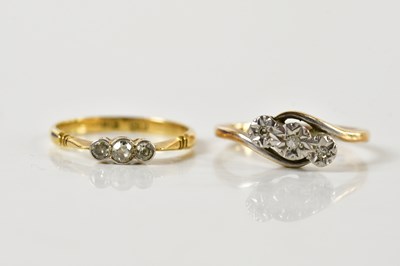 Lot 1478 - An 18ct yellow gold illusion set three stone...