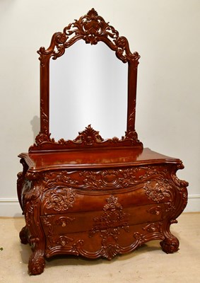 Lot 2450 - A modern carved and stained hardwood...