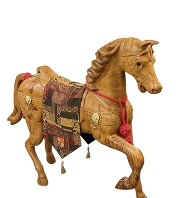 Lot 386 - A 20th century hand carved pitch pine figure...