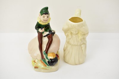 Lot 561 - BELLEEK; a small decorative porcelain jug in...