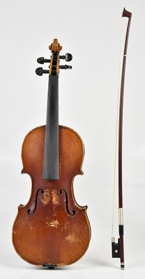 Lot 1594 - A half size German violin with one-piece back...