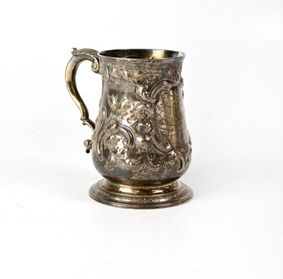 Lot 836 - A George II silver mug of baluster form, the...