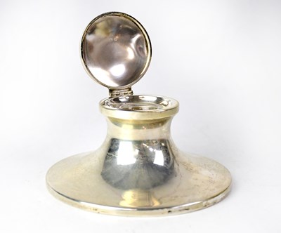 Lot 636 - A hallmarked silver capstan inkwell,...