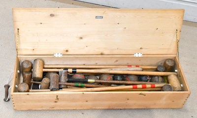 Lot 1639 - A vintage croquet set within pine Bazar...