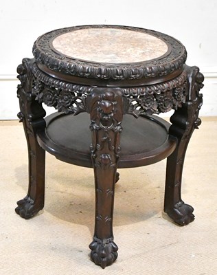 Lot 1038 - A Chinese carved rosewood two tier jardinière...