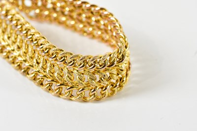 Lot 1534 - A 9ct yellow gold pierced hollow link bracelet...