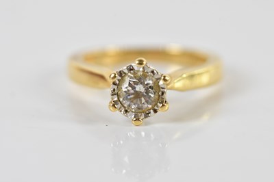 Lot 1339 - An 18ct yellow gold single stone diamond...