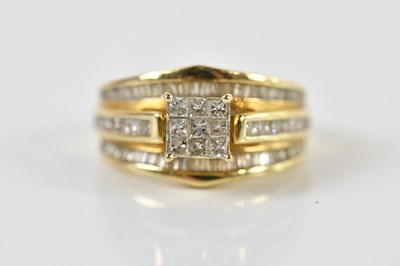 Lot 1316 - A 9ct yellow gold diamond set dress ring with...